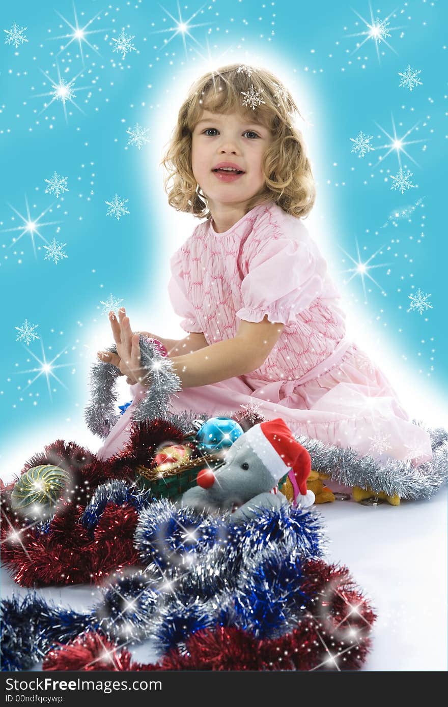 Beautiful little girl with christmas decoration on isolated background