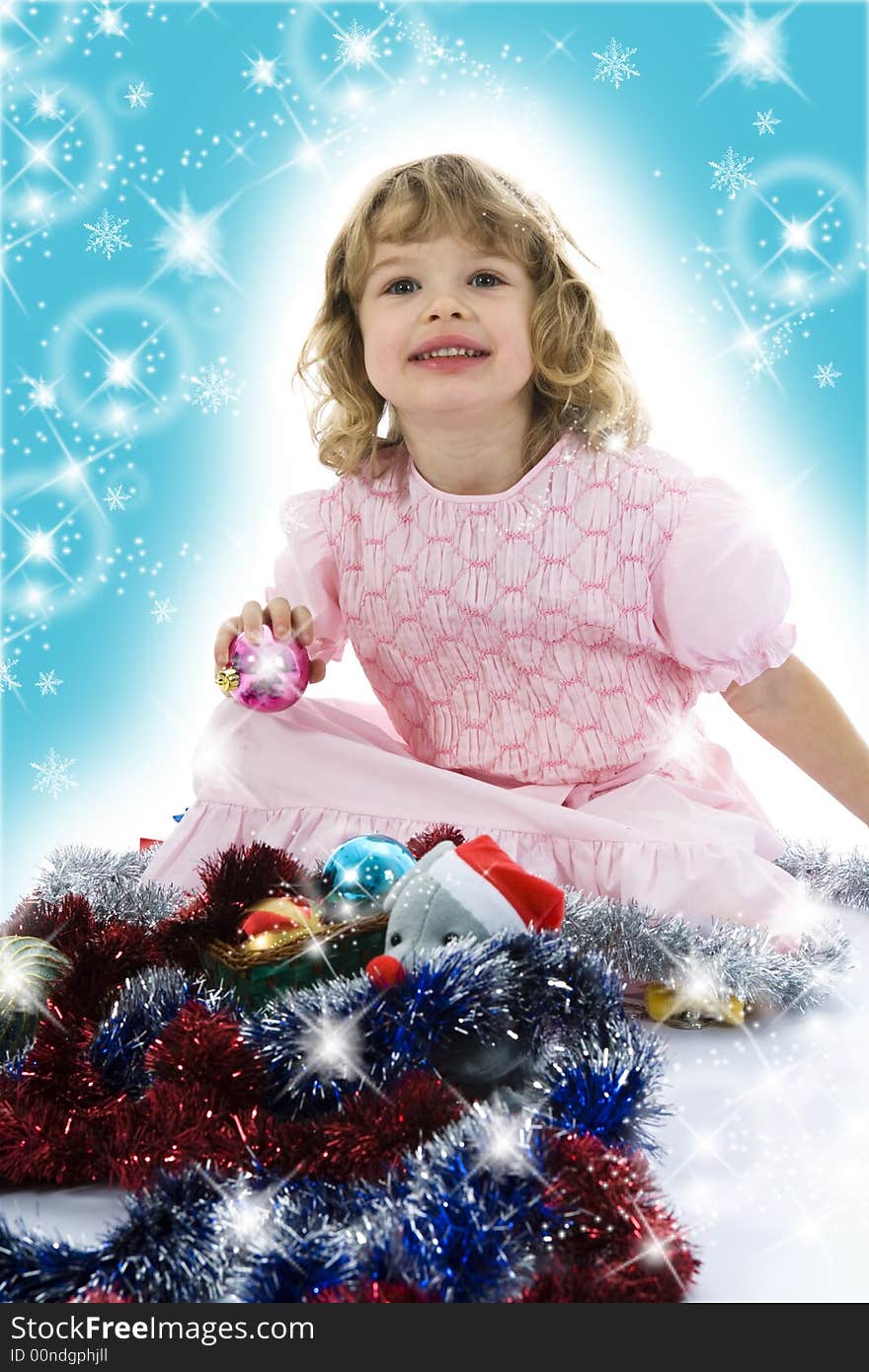 Beautiful little girl with christmas decoration on isolated background