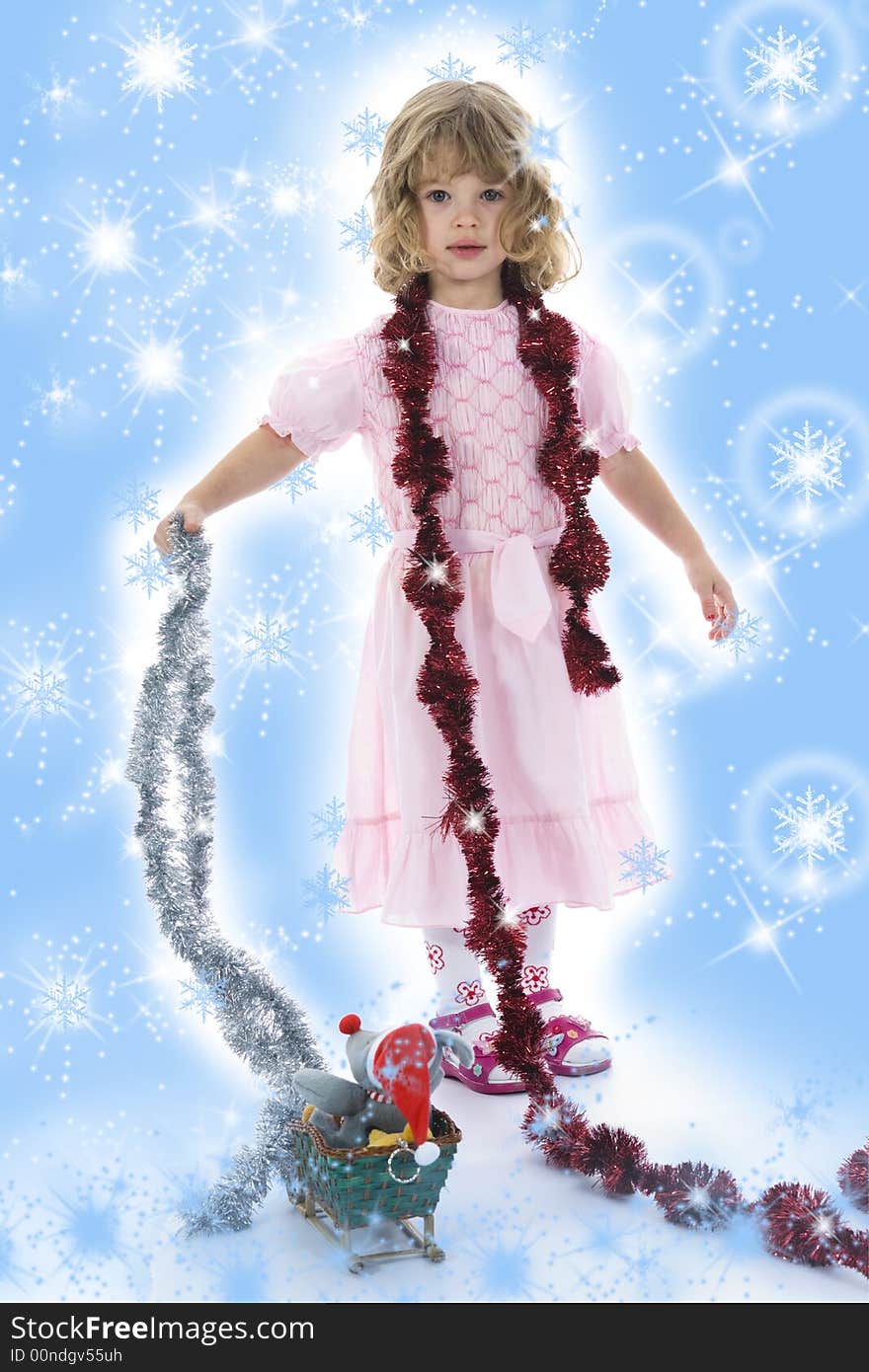 Beautiful little girl with christmas decoration