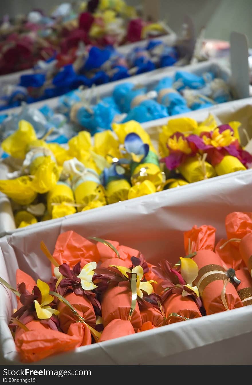 Colorful Bon-bons or Christmas crackers being sold on Christmas gift market. Colorful Bon-bons or Christmas crackers being sold on Christmas gift market.