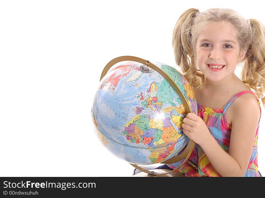 Happy little girl holding globe