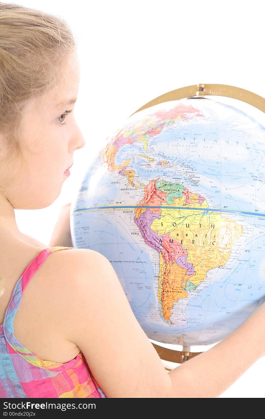 Photo of a little girl holding globe from behind