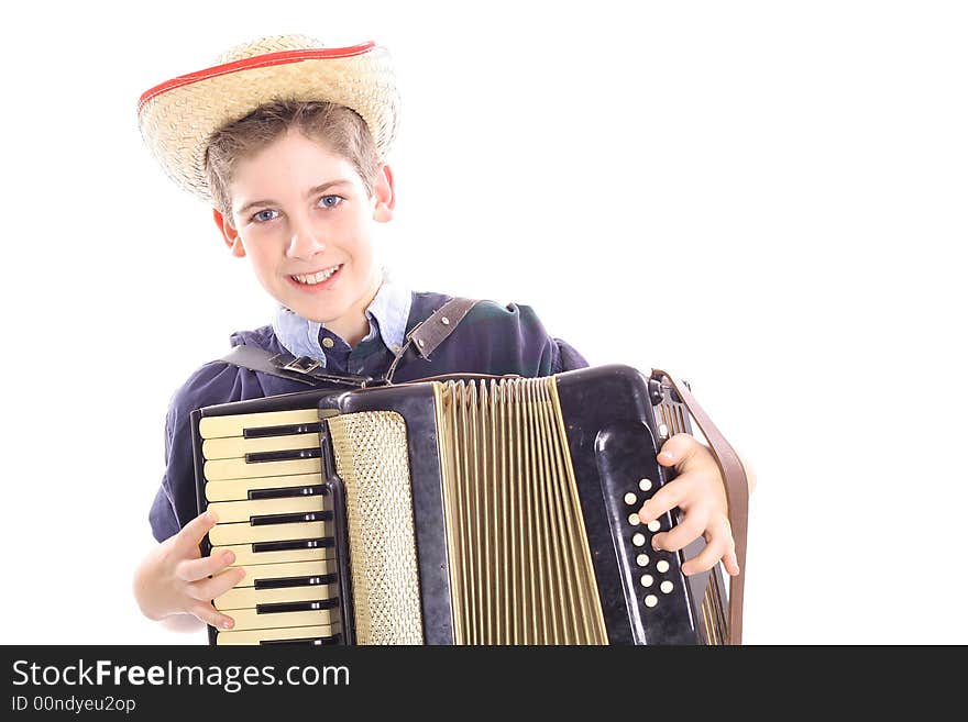 Shot of a young boy playing an accordion