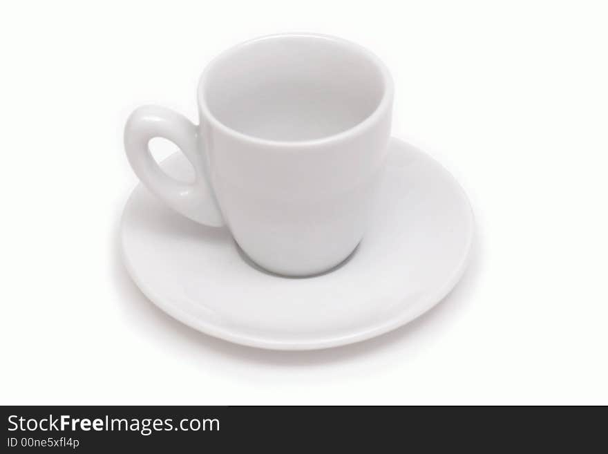 White cup on the white saucer. White cup on the white saucer