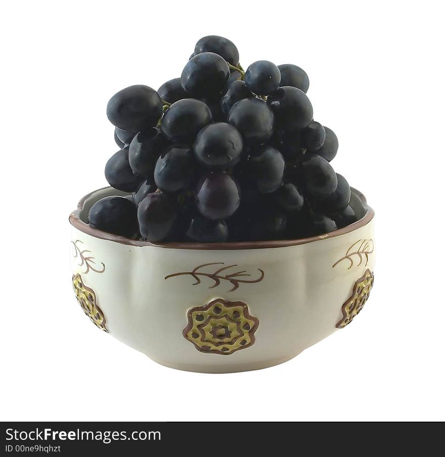 Grapes in ceramic bow.