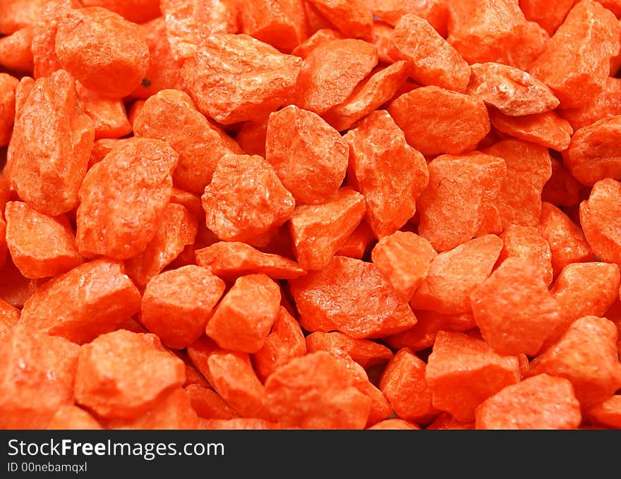 A close-up of orange-colored stones. A close-up of orange-colored stones