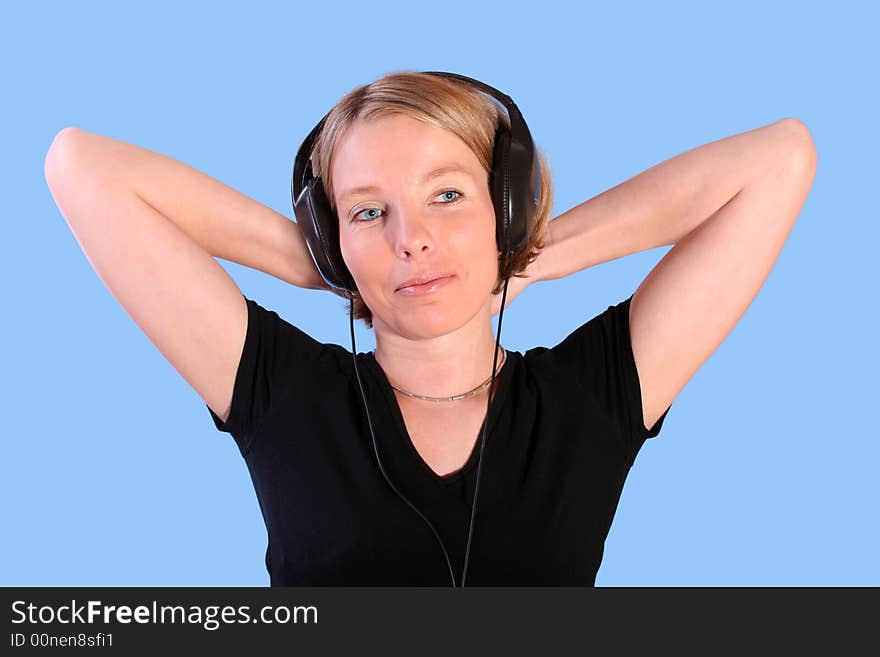 Young beautiful happy women listening music