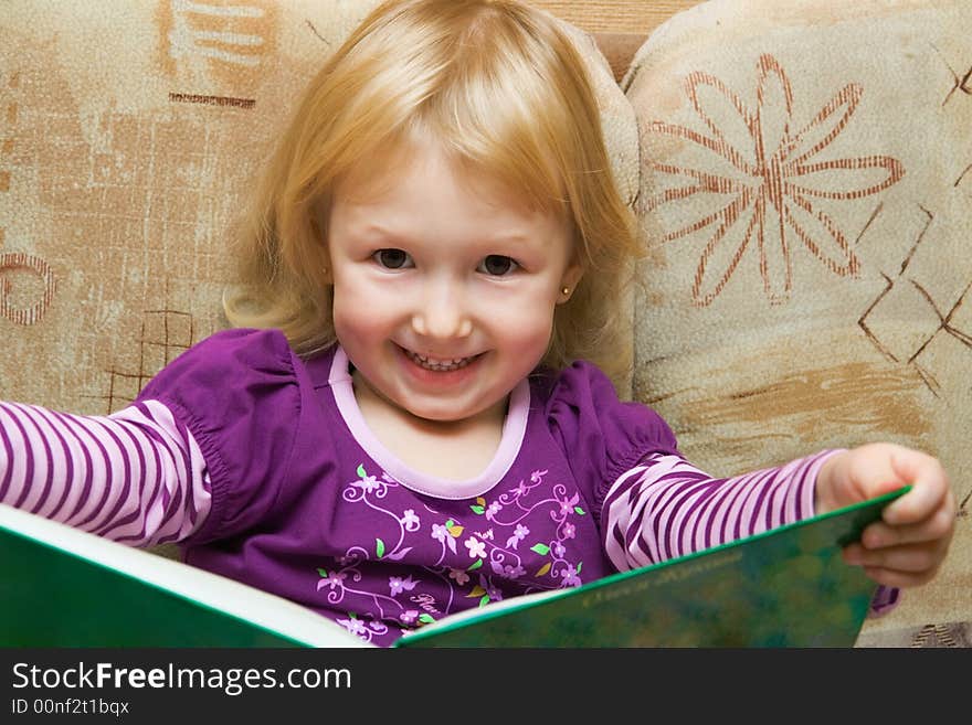 Small girl with the book