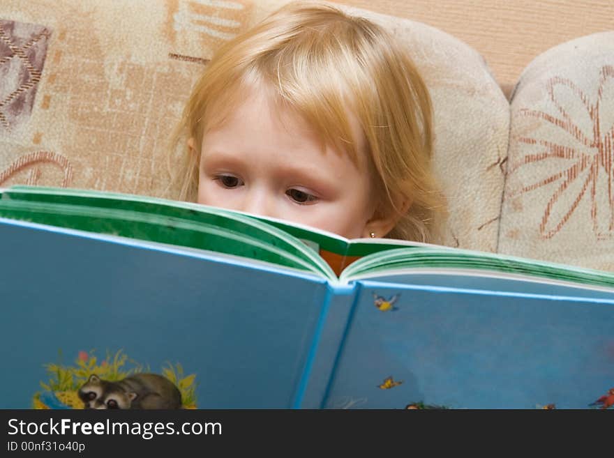 Small girl with the book