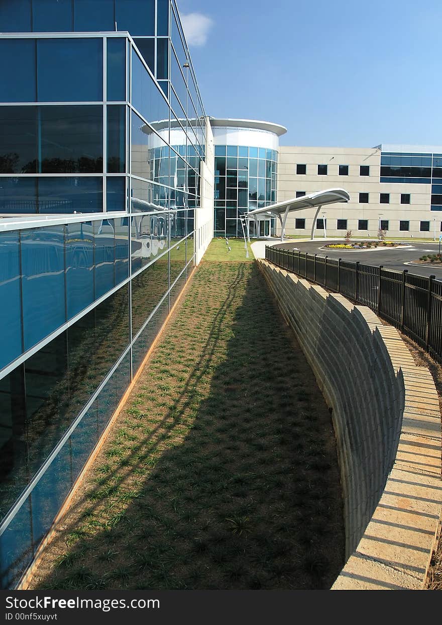 Office Building with stone and glass exterior. Office Building with stone and glass exterior