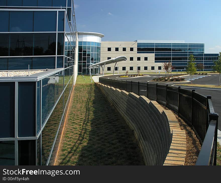 Office Building with stone and glass exterior. Office Building with stone and glass exterior