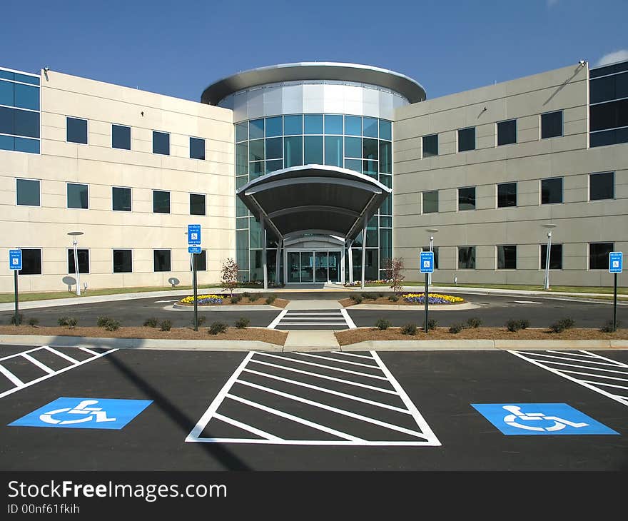 Office Building with stone and glass exterior. Office Building with stone and glass exterior