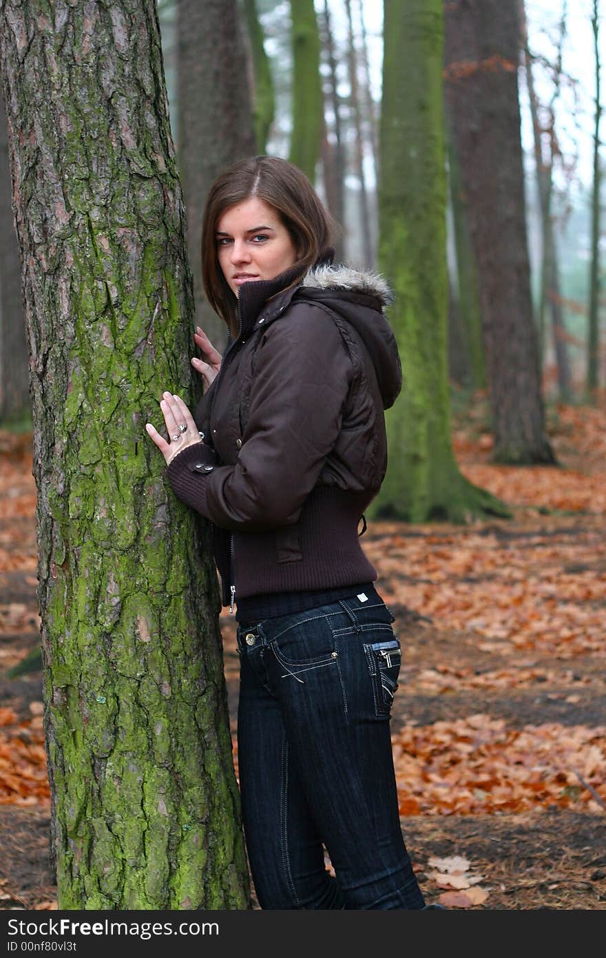 Young girl walking in the forest. Young girl walking in the forest