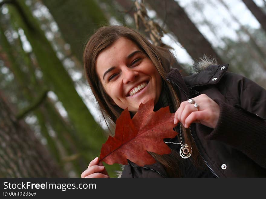 Young girl walking in the forest. Young girl walking in the forest