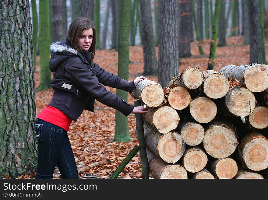 Young girl walking in the forest. Young girl walking in the forest