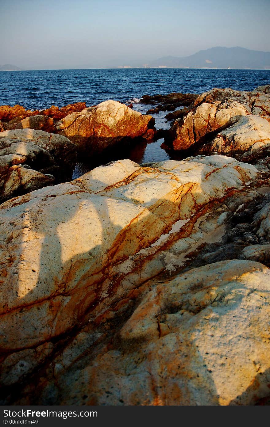 There are some colorful rocks on the island. There are some colorful rocks on the island.