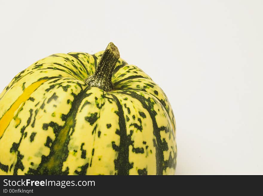 Green and yellow ornamental squash