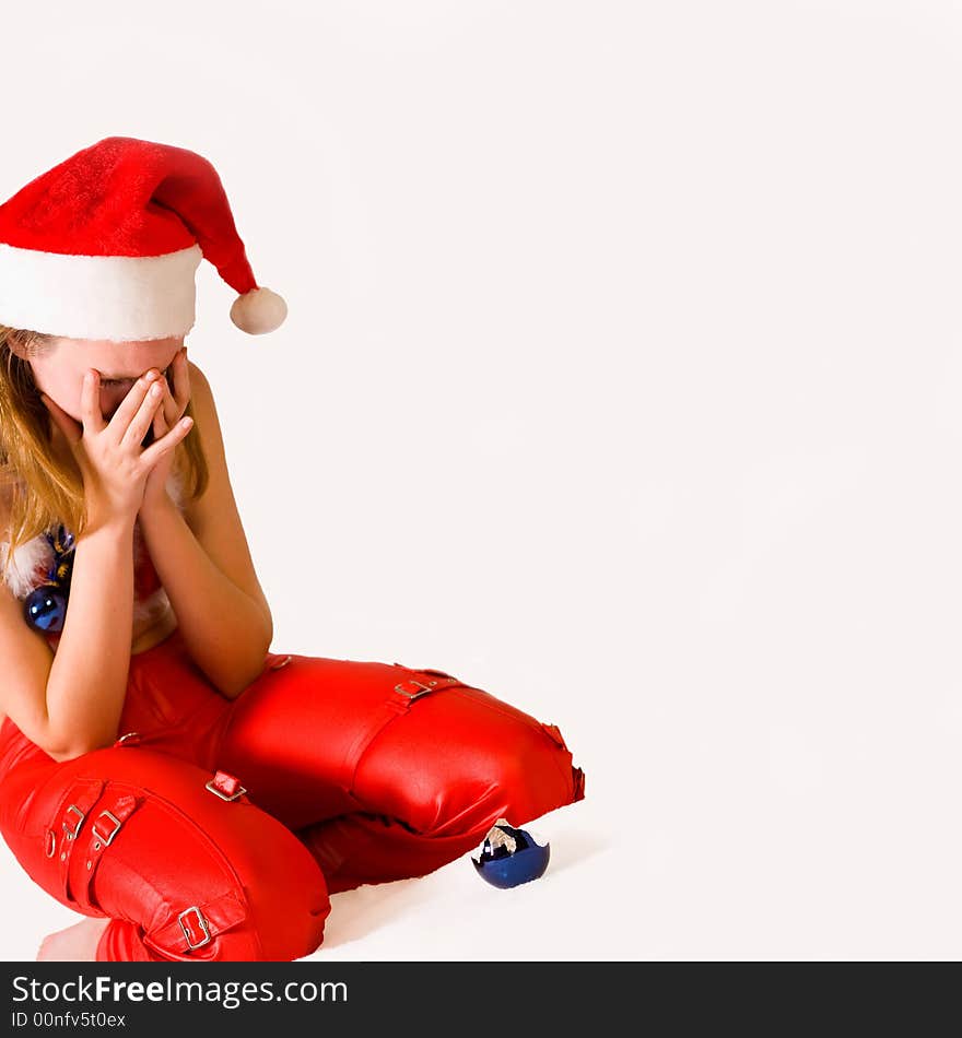 Portrait of a crying christmas faerie with a broken christmas ball. Portrait of a crying christmas faerie with a broken christmas ball