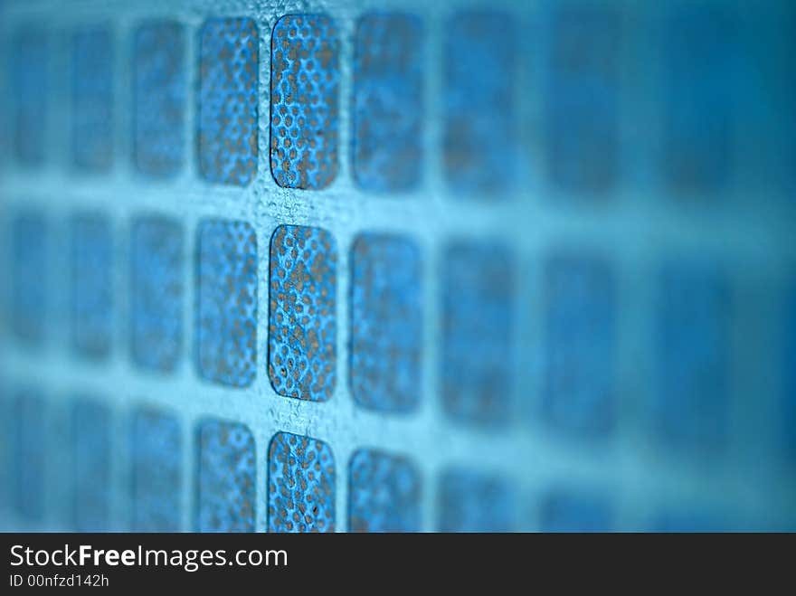 A close up image of a blue and green grid. A close up image of a blue and green grid