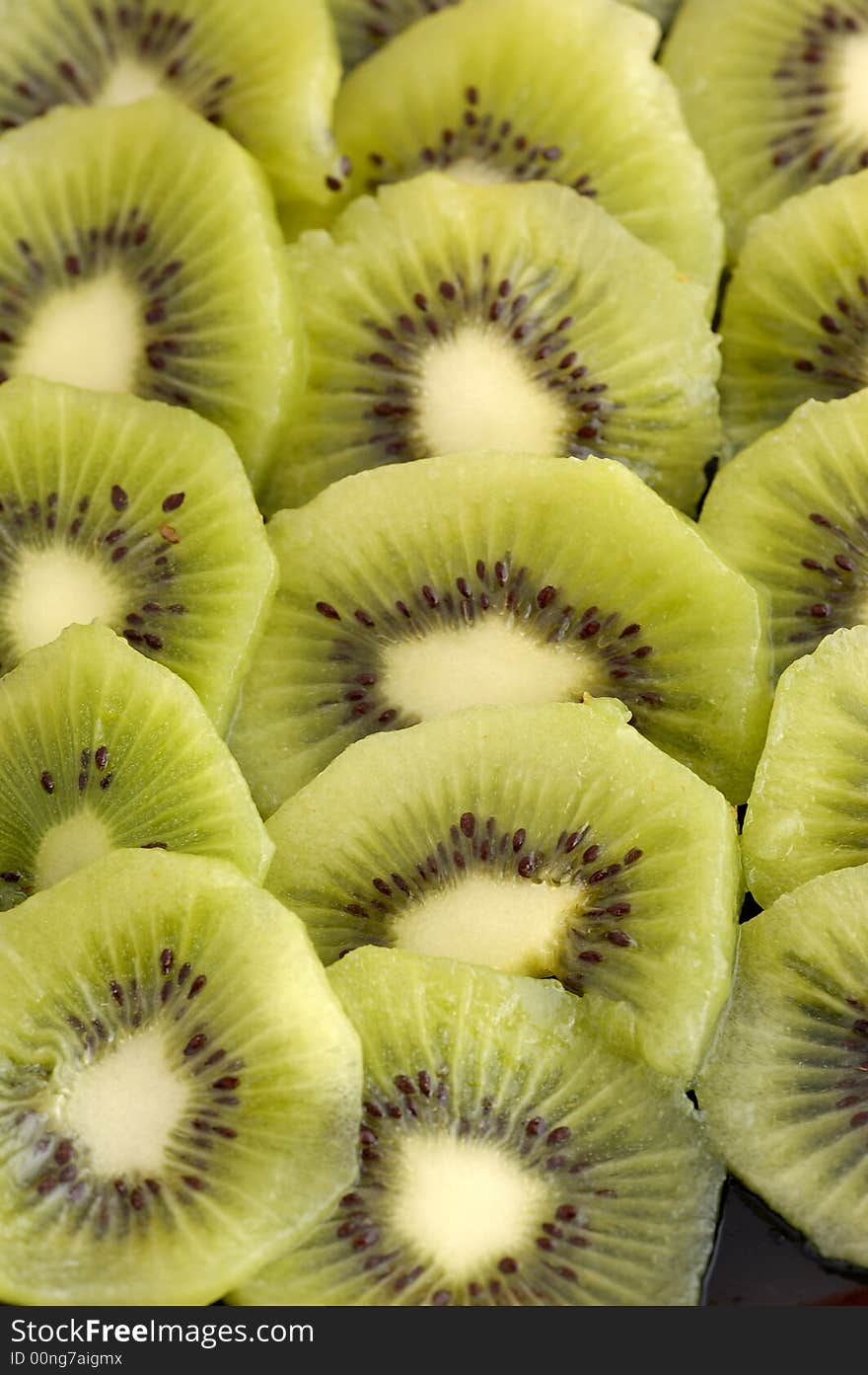 Close up of green kiwi cut