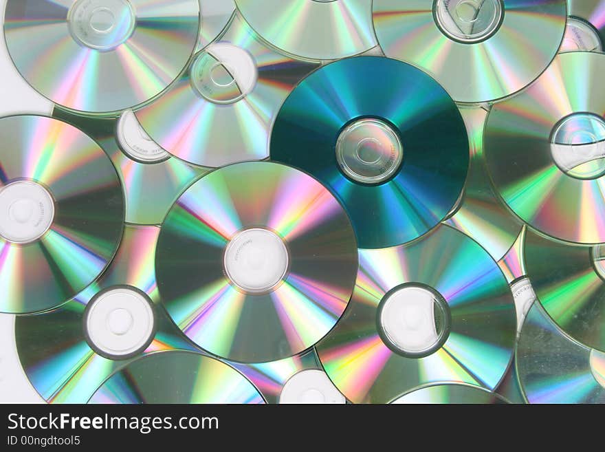 A single blue cd among silver ones