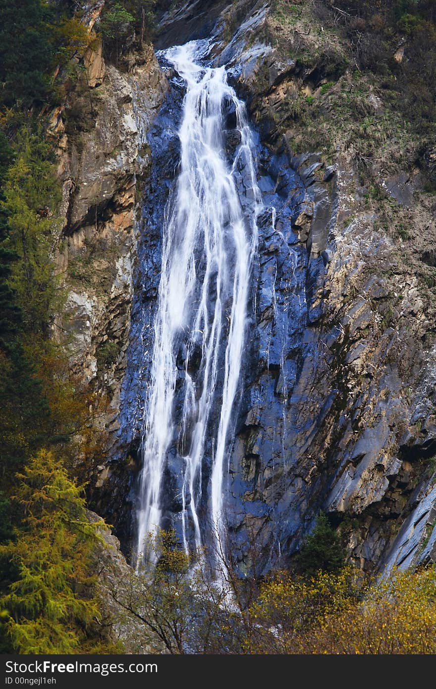 The waterfall and the rocks around it.