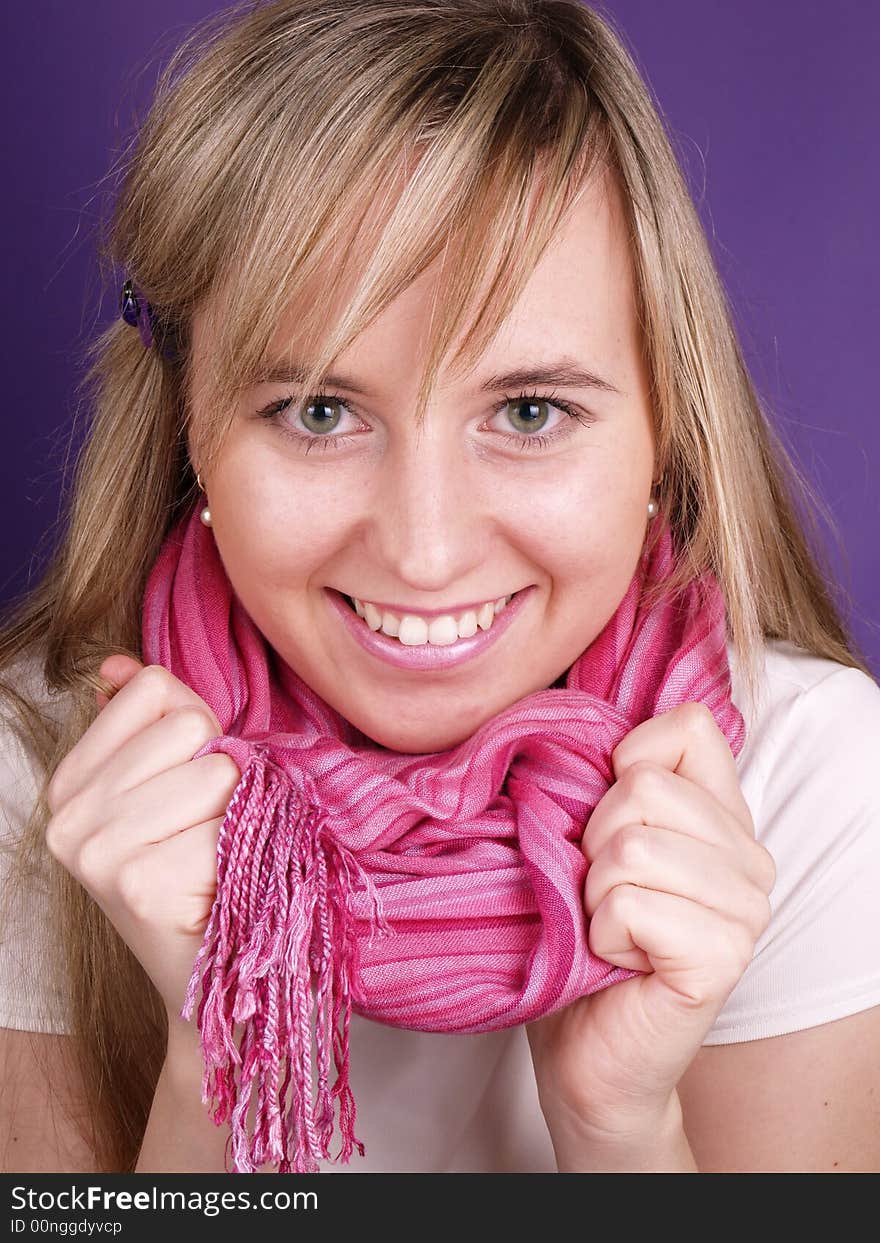 Girl holding pink scarf