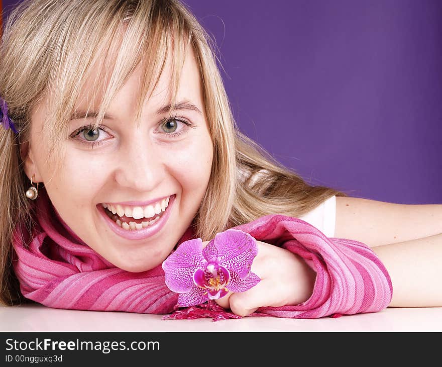 Beautiful woman with orchid.