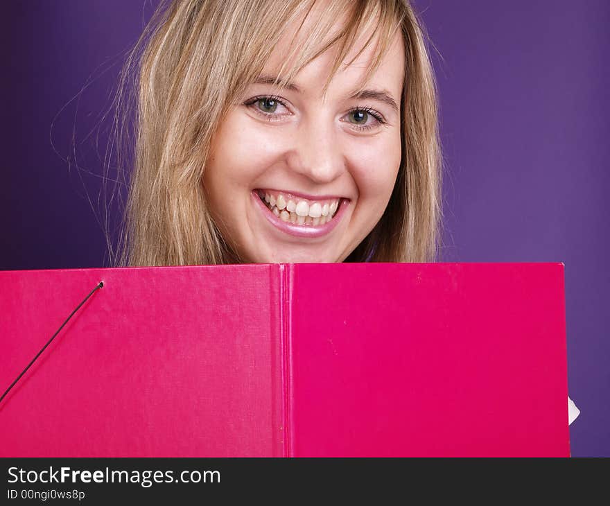 Smiling girl with folder