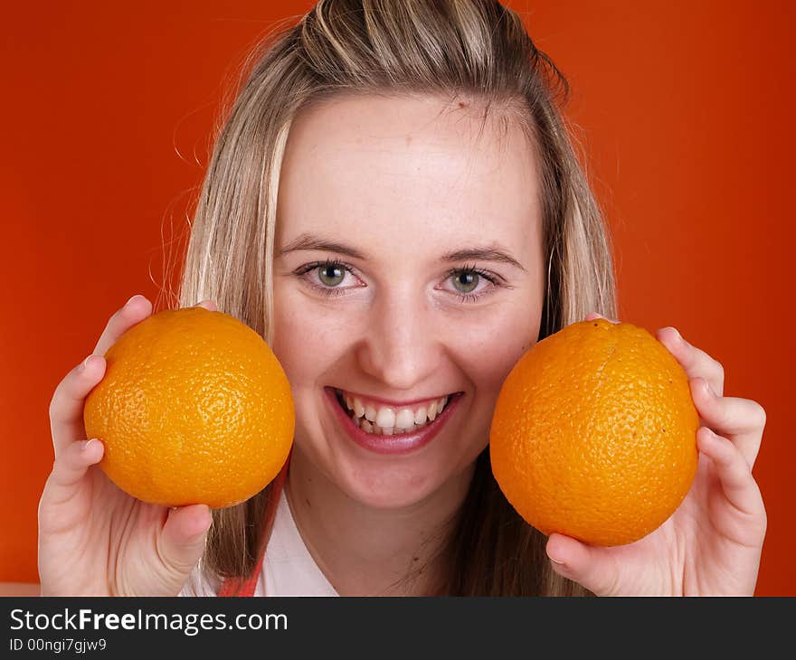 Smiling Girl With Oranges.