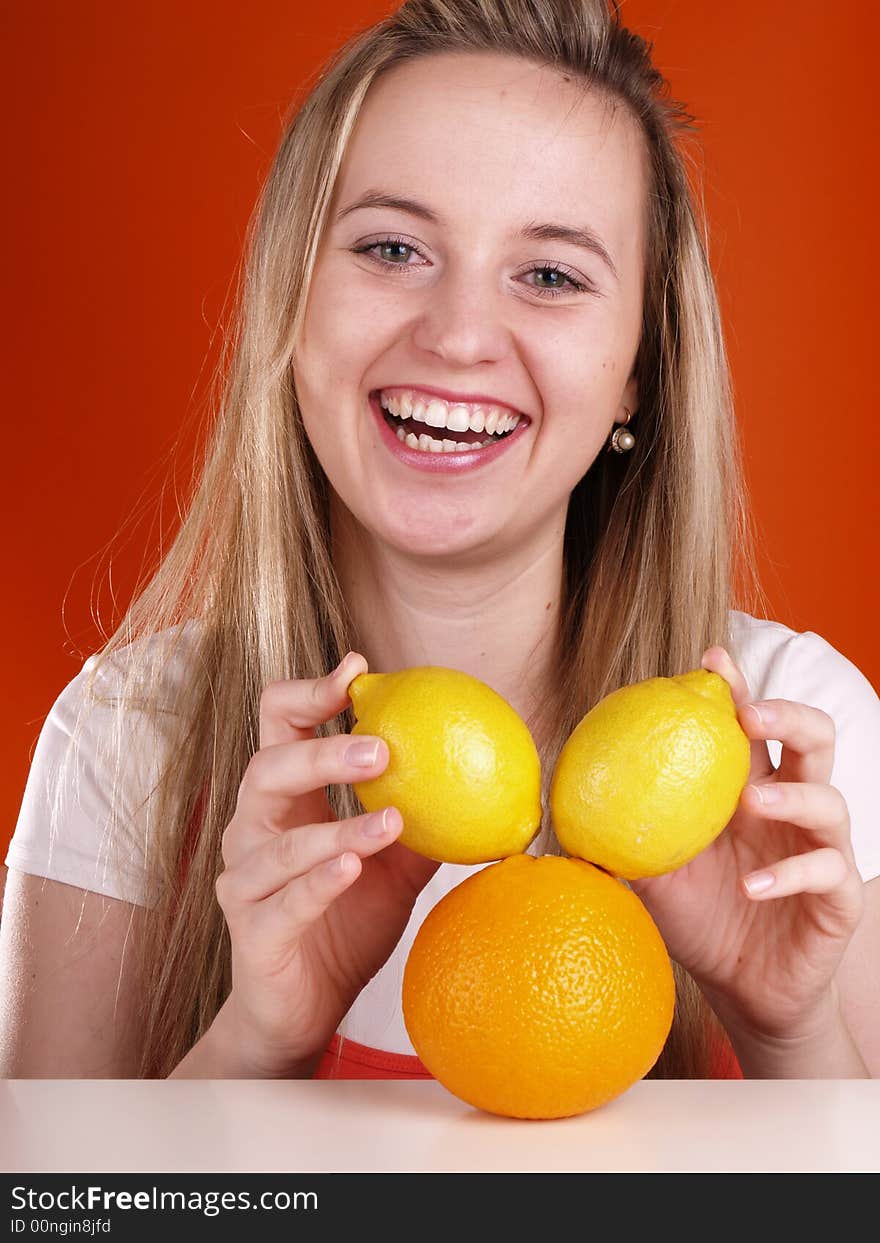 Girl has fun with fruits