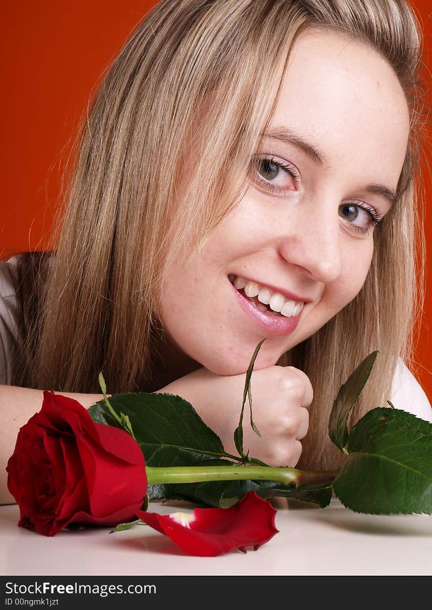 Young woman in love and red rose. Young woman in love and red rose