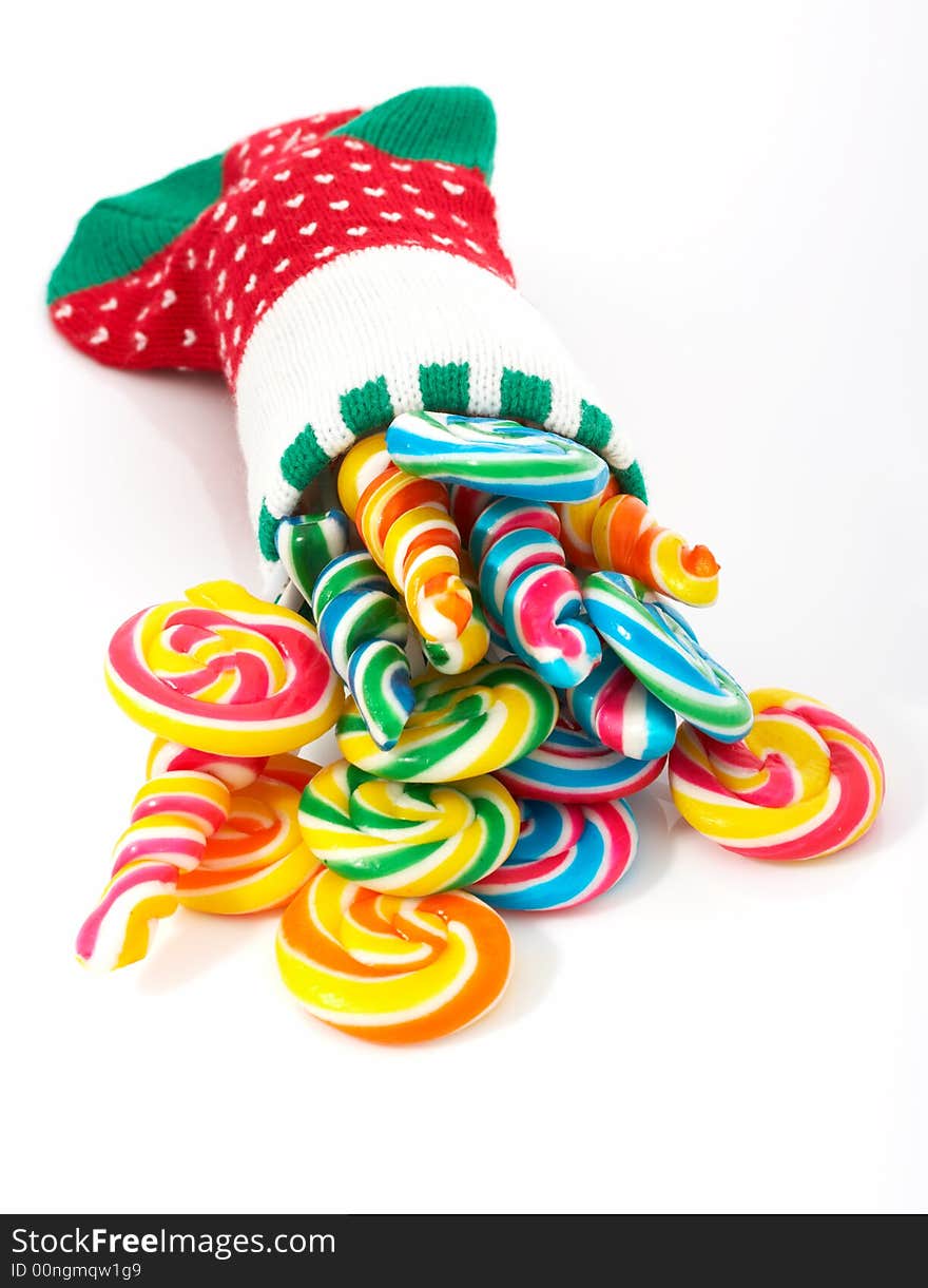 A christmas stocking with lollipop candies inside. A christmas stocking with lollipop candies inside