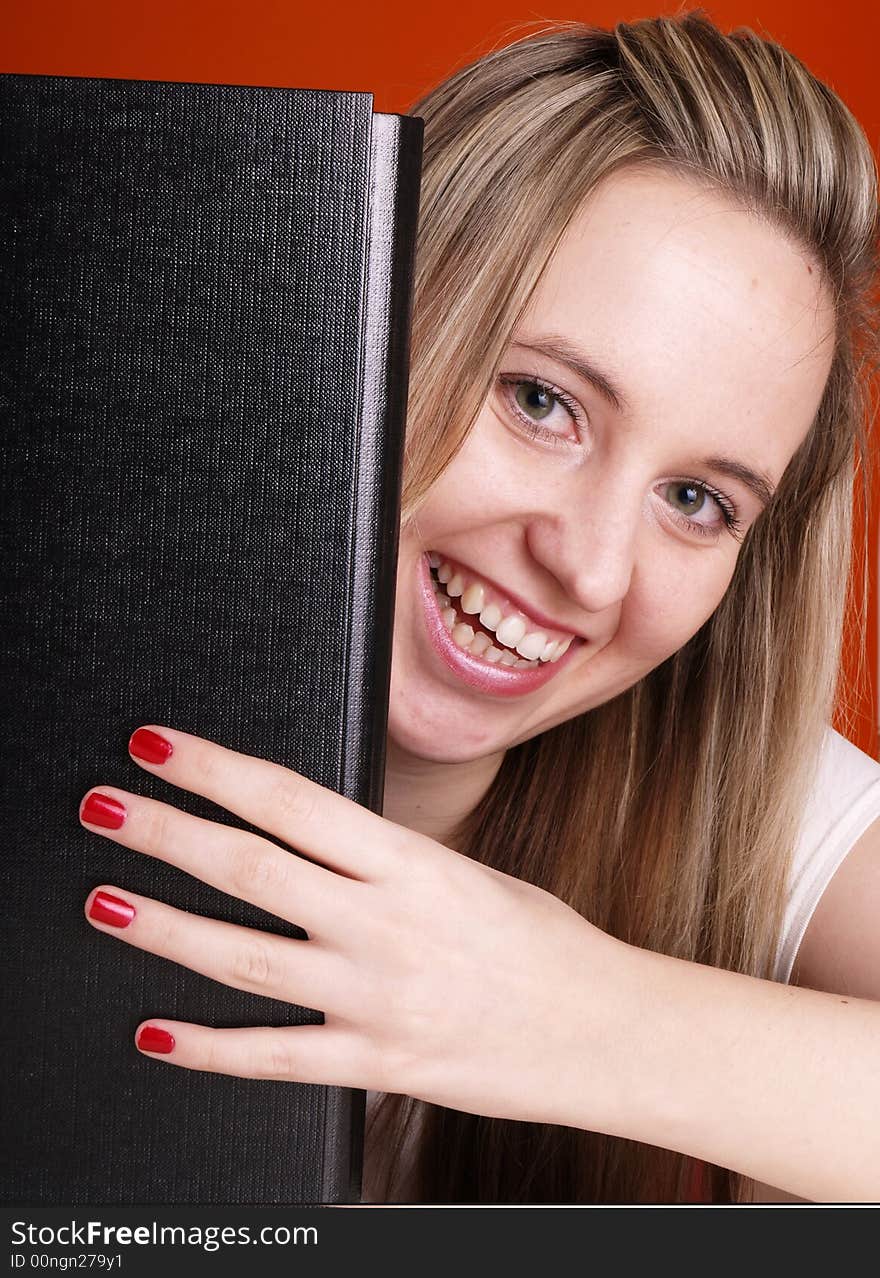 Smiling woman with folder