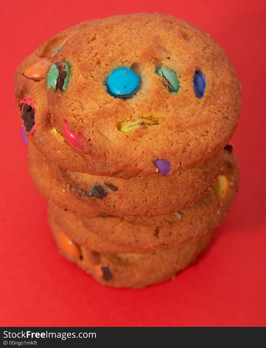 Tasty chocolate chip cookies on a red background. Tasty chocolate chip cookies on a red background