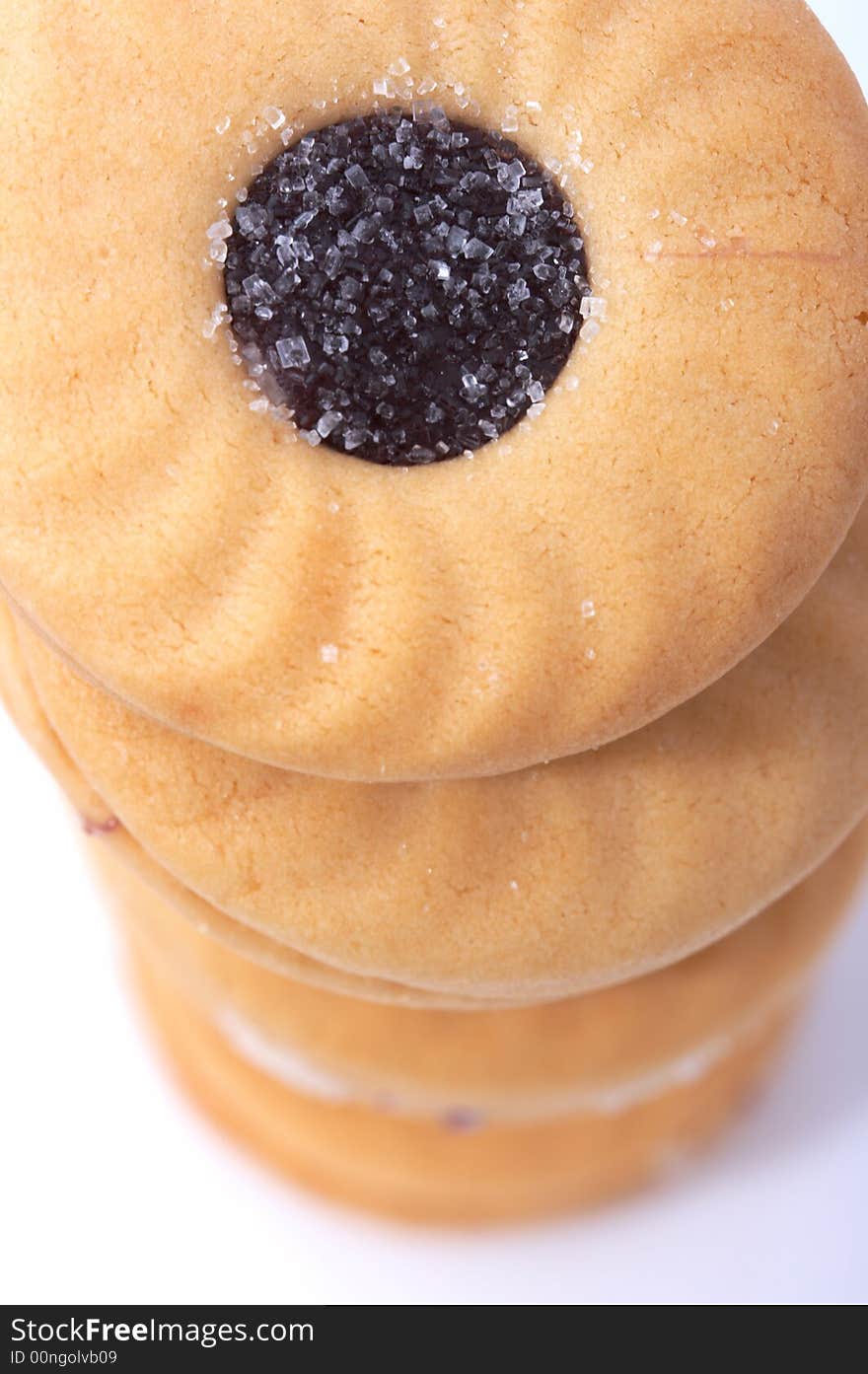 Stack of tasty biscuits over a white background