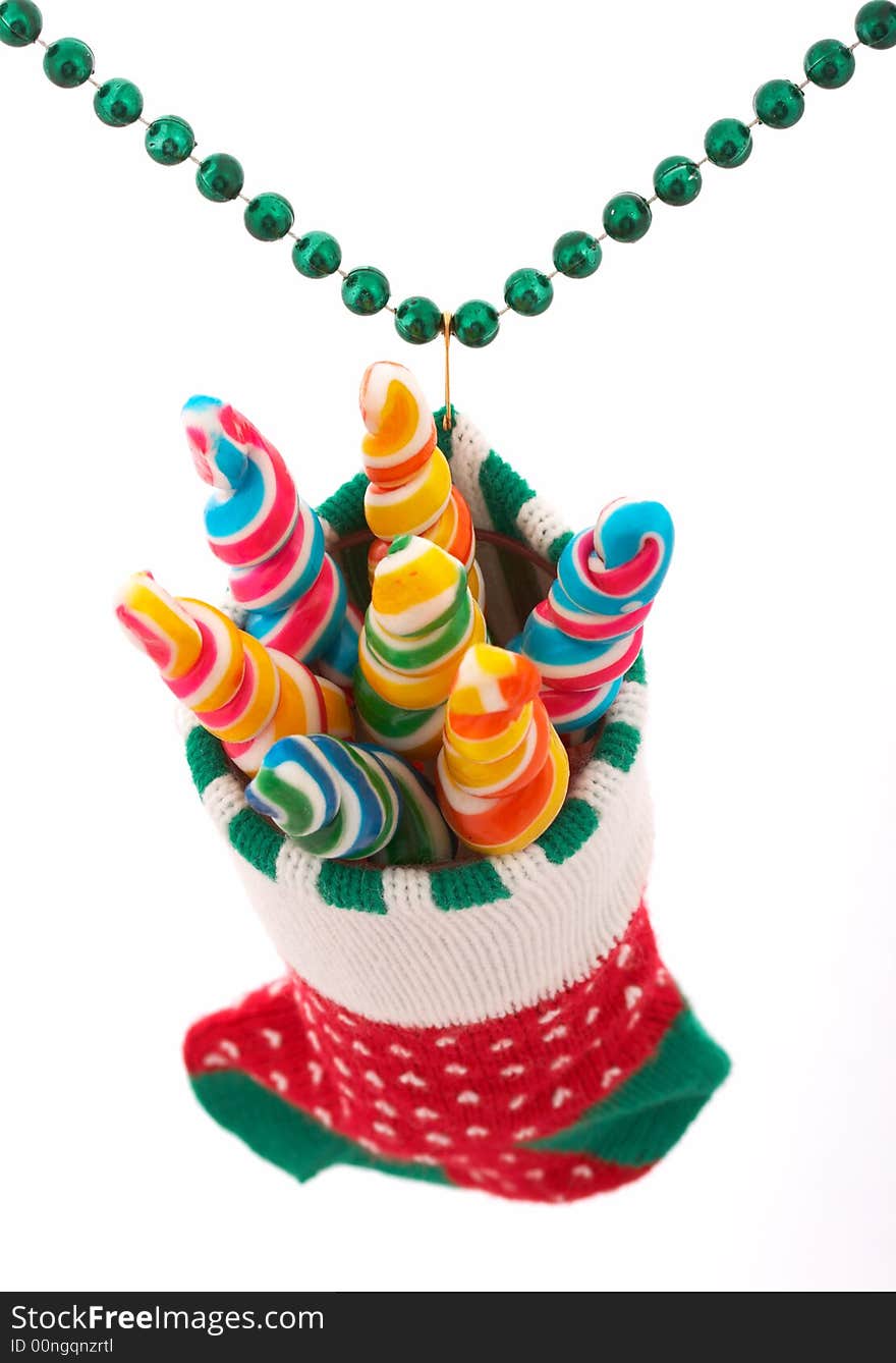 A christmas stocking with lollipop candies inside. A christmas stocking with lollipop candies inside