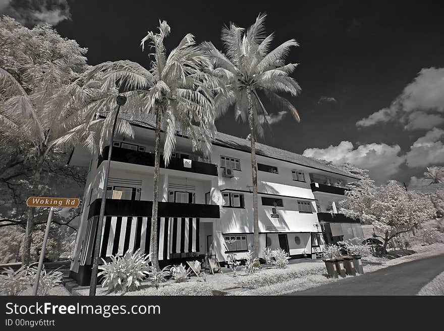 Infrared photo – tree, old house and cloud