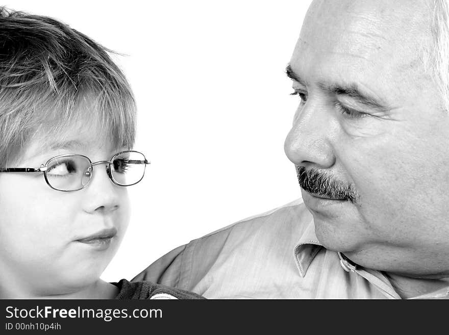 Grandfather grandson forehead over white background