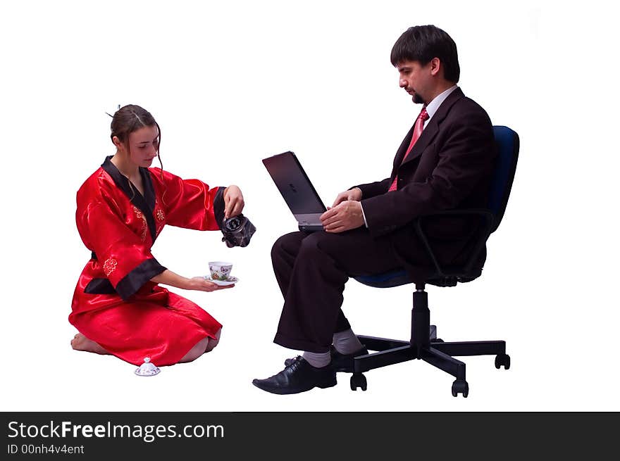 A girl in red kimono give cap of tea a businessman. isolated on white. A girl in red kimono give cap of tea a businessman. isolated on white