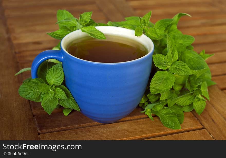 Mint tea with fresh tea leaves.