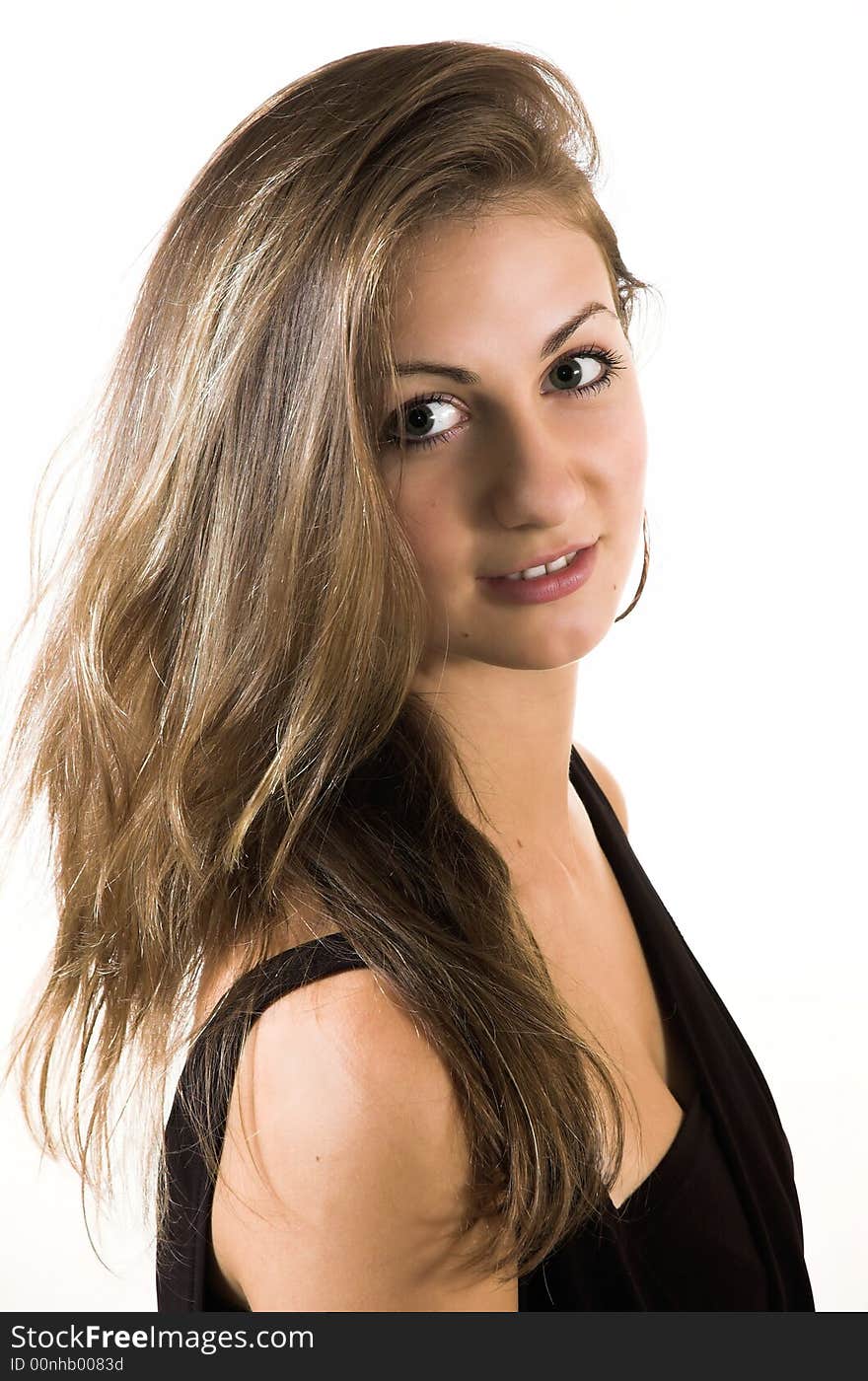 Portrait of the girl with long hair on a white background