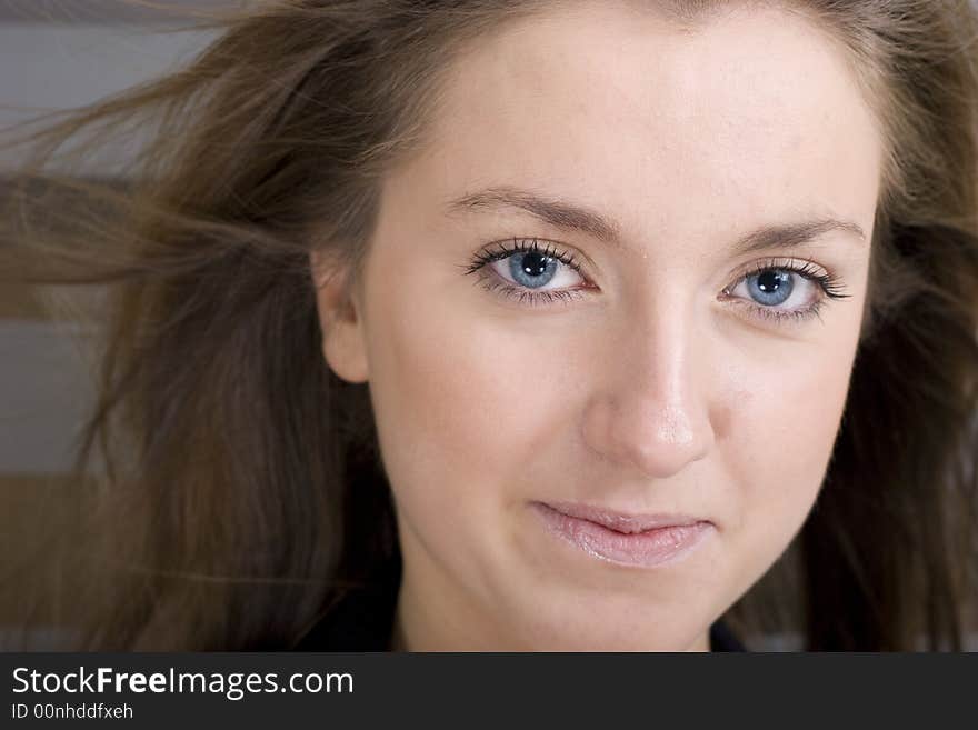 Portrait of a friendly professional woman looking nicely at the camera. Portrait of a friendly professional woman looking nicely at the camera.