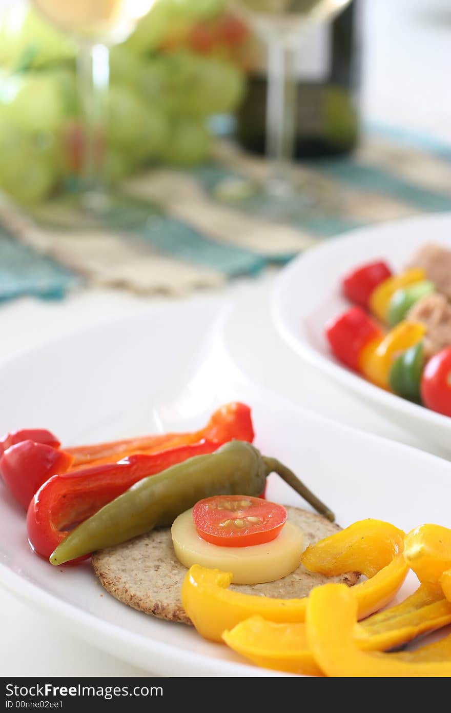 Healthy colorful vegetable platter with assorted vegetables, fish and biscuits. Healthy colorful vegetable platter with assorted vegetables, fish and biscuits