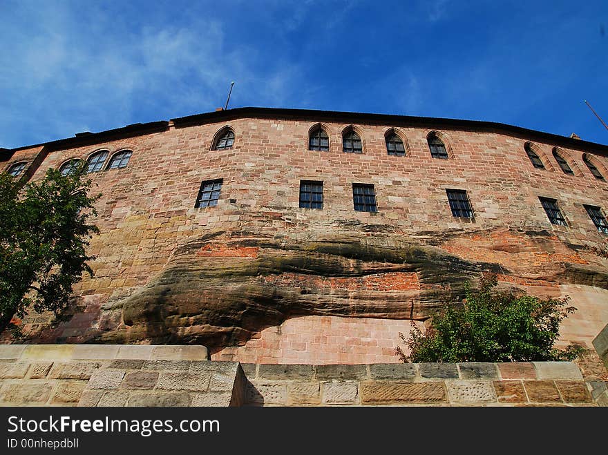 In Nuremberg. The wall is natural rock under the windows, buidling directly out of the sandstone. In Nuremberg. The wall is natural rock under the windows, buidling directly out of the sandstone