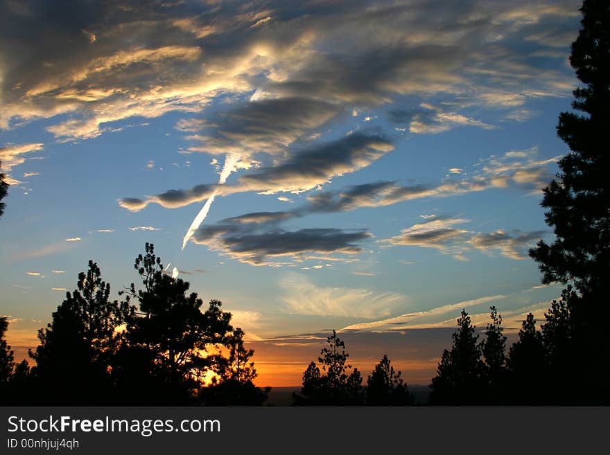 Lots of little clouds strewn over a sunset. Lots of little clouds strewn over a sunset.