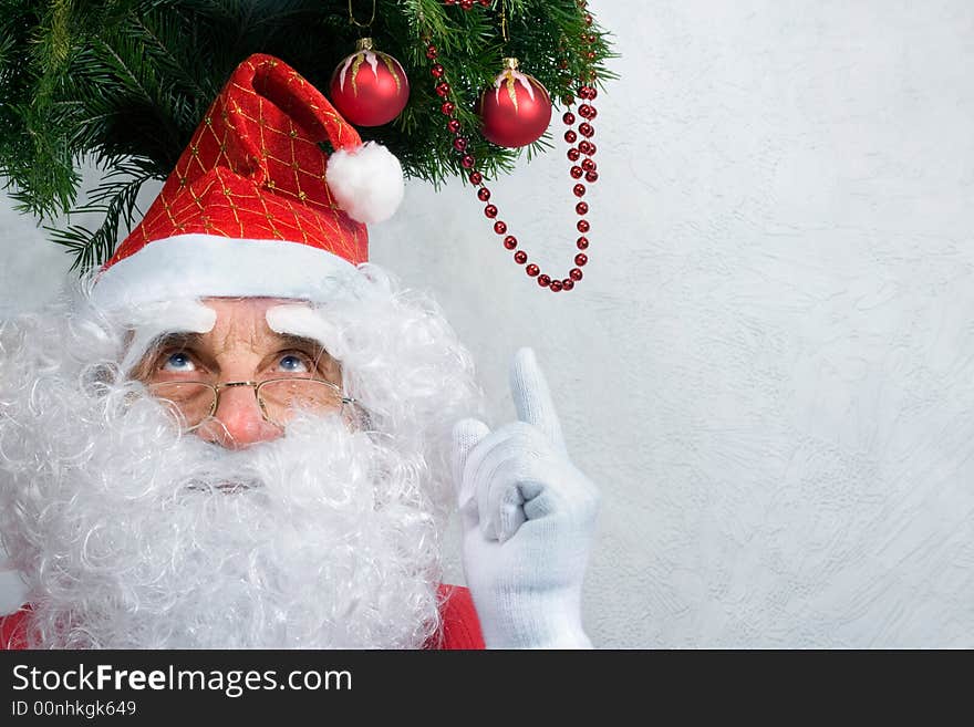 Santa Claus with christmas tree, copy space in on right. Santa Claus with christmas tree, copy space in on right