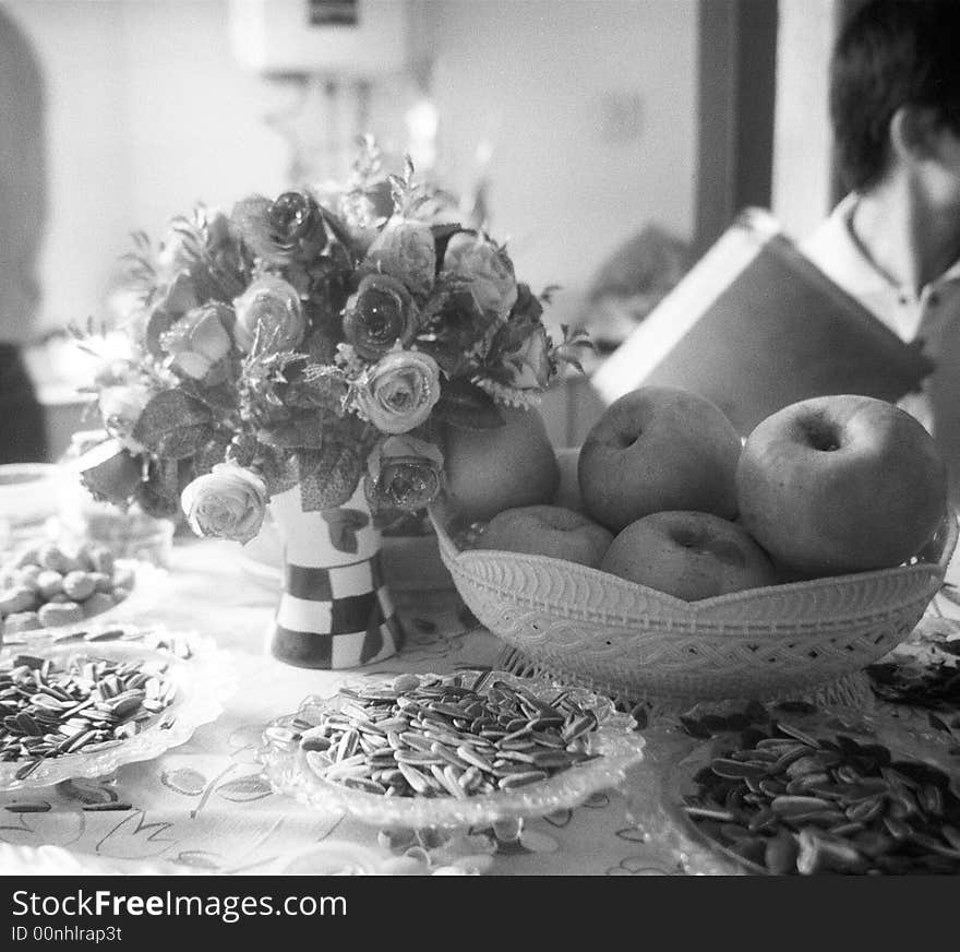 Flowers and apples on a dinner table. Shot in a Chinese wedding. Flowers and apples on a dinner table. Shot in a Chinese wedding.