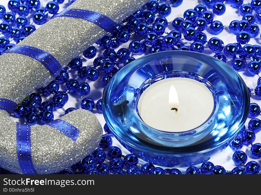 New-years decoration (candle, tinsel )