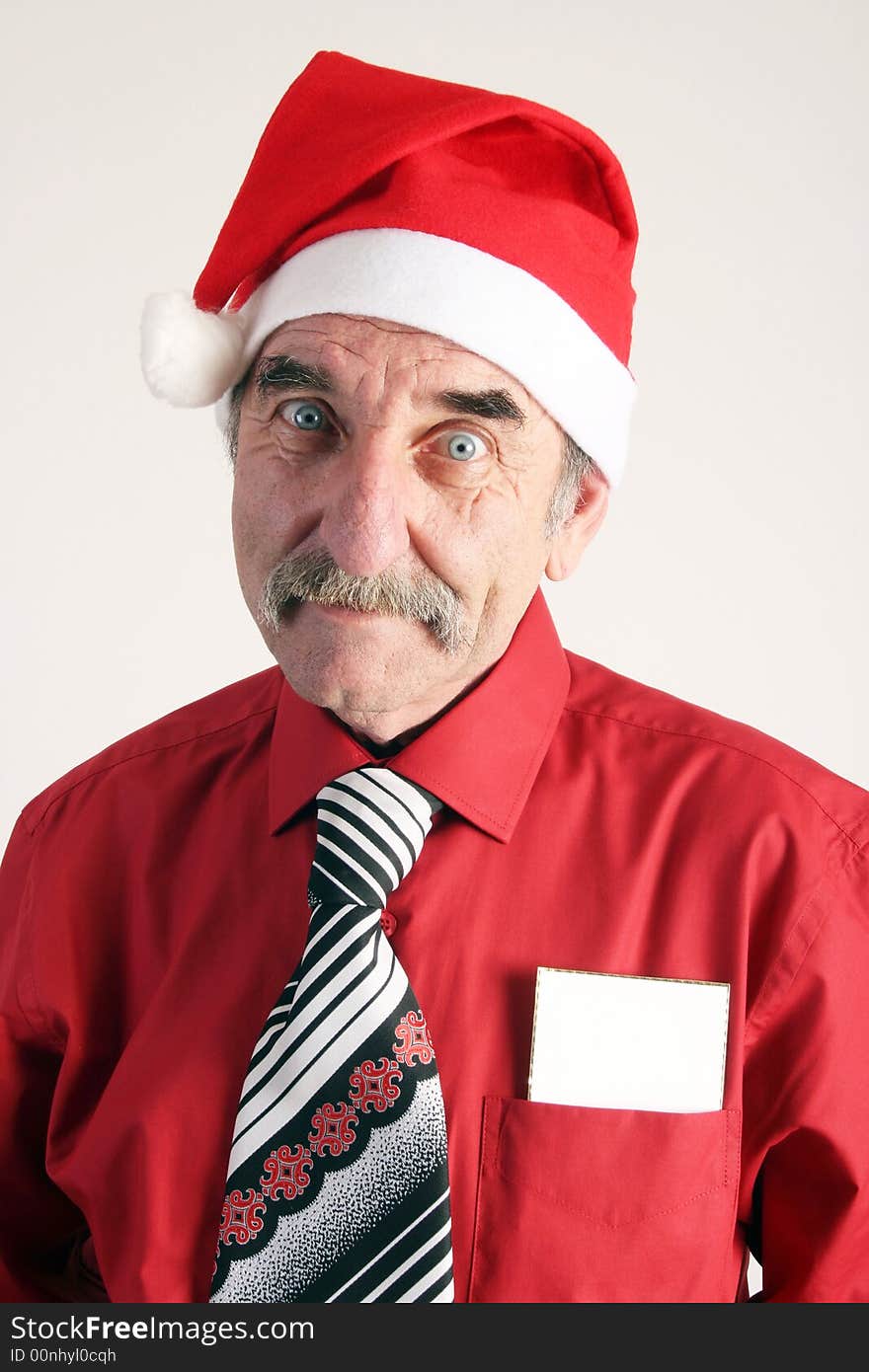 Man with santas's hat with a white card on white background. Man with santas's hat with a white card on white background